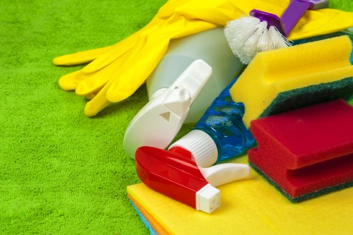 Staff member using protective equipment during carpet cleaning