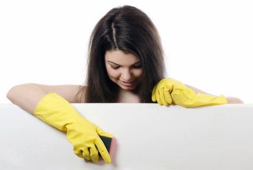 Technician working on upholstered furniture with pet stains